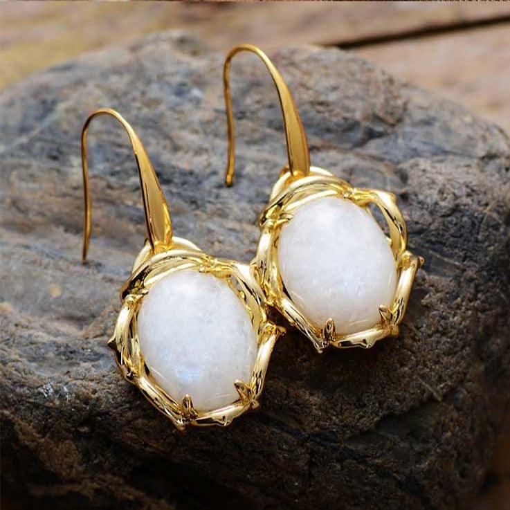 Moonstone Crown Oval Drop Earrings – Handmade moonstone earrings framed in gold, glowing white crystal jewellery. | ALLORA JADE