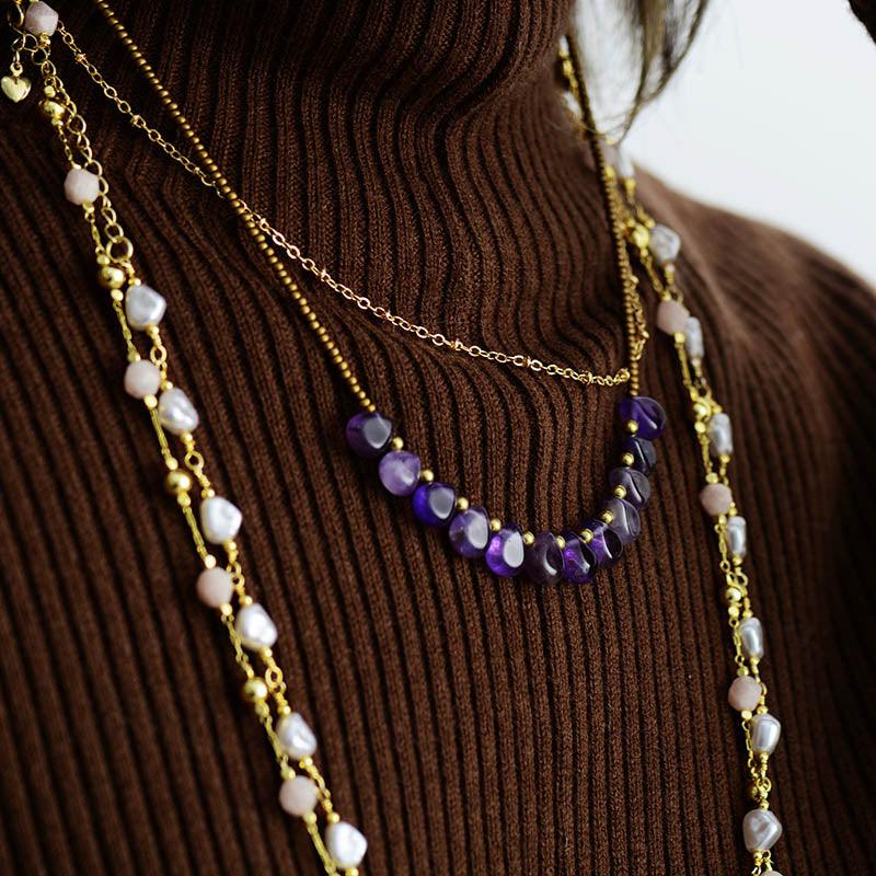 Model wearing purple Amethyst and seed bead necklace. ALLORA JADE