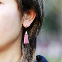 Model wearing Rhodonite Ascend Earrings – pink crystal drop earrings with silver hook, handmade by Allora Jade