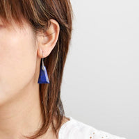 Model wearing Lapis Lazuli Ascend Earrings – deep blue crystal drop earrings with silver hook, handmade by Allora Jade