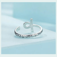 Ankh Egyptian Cross Sterling Silver open ring with decorative design on a light blue background