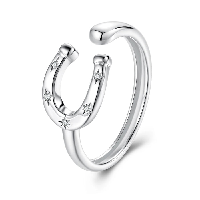Silver ring with horseshoe design and small diamonds on a white background