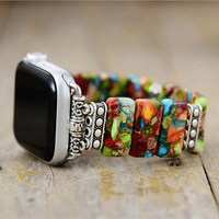 Colourful beaded bracelet with a silver clasp on a wooden surface. Flower Jasper Stretchy Apple Watch Band | ALLORA JADE