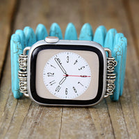 Watch with turquoise bracelet on a wooden surface. Turquoise Beads Stretchy Apple Watch Band | ALLORA JADE