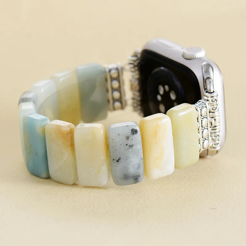 Beaded bracelet with a metallic clasp on a beige background. Amazonite Stretchy Apple Watch Band | ALLORA JADE